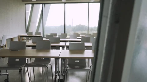 Empty bright classroom with big windows Stock Footage 104075544