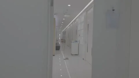 Empty Bright White Hospital Corridor Stock Footage 345471089