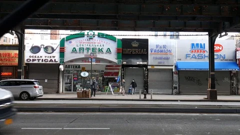 Empty Brighton Beach Open Russian Pharmacy Coronavirus Lockdown Stock Footage 129580446