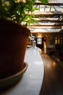 Empty british pub looking down at the pumps, tables and chairs. Stock Photos