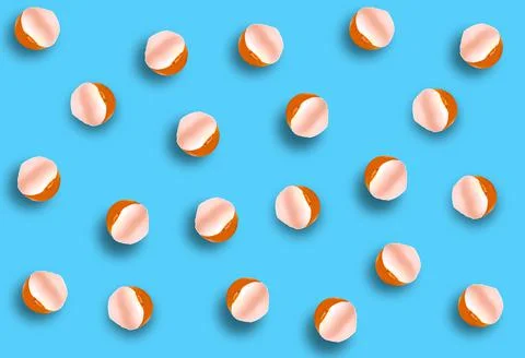An empty broken half of an eggshell on a blue background. Stock Photos