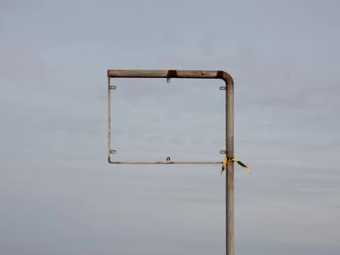 Empty Broken Sign Frame with Yellow Plastic Stock Photos