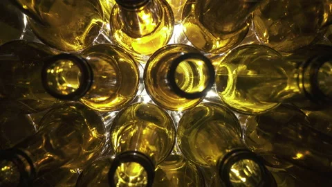 Empty brown beer bottles, the top view on a white background,Dolly shot Stock Footage 150061581
