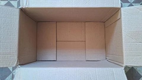 Empty brown cardboard box viewed from a high angle perspective Stock Photos