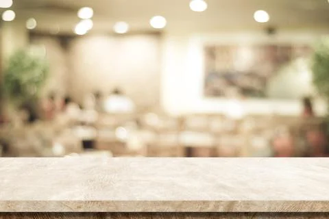 Empty brown cement table over blur store background, product display montage Foto stock