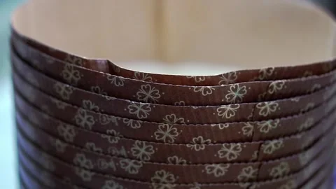Empty brown paper baking forms for Easter cakes in stack Stock Footage 234697552