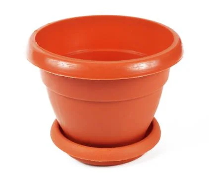 Empty brown plastic flower pot on white background, isolate, close-up Stock Photos