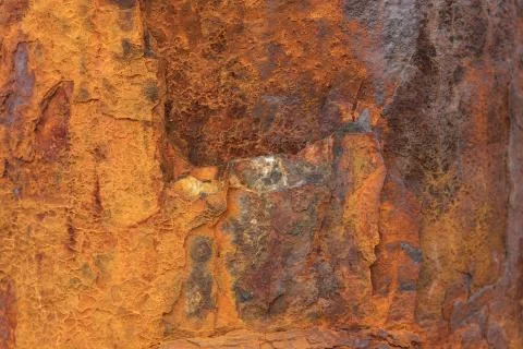 Empty brown rusty stone or metal surface texture. Long banner format. Stock Photos