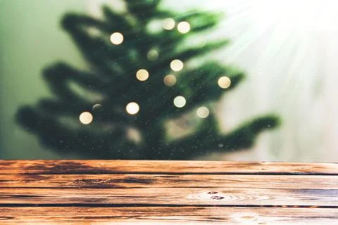 Empty brown wooden background on the background of the Christmas tree Stock Photos