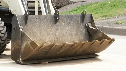 Empty bucket of an idle tractor. Stock Footage 131960973
