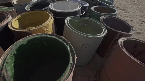 Empty Buckets of Paint Slow Motion Shot Stock Footage 98457902