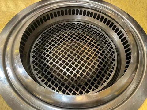 Empty Built in Stainless Steel Bbq Grill with Square Grate on a Wooden Table Stock Photos