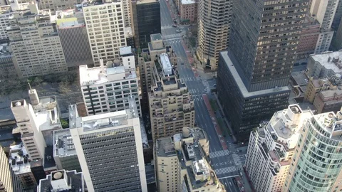 Empty bus lanes on a Midtown Manhattan avenue crossing Stock Footage 128549166