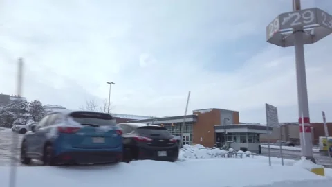 Empty Bus Station at Fairview Mall on Fresh Snowy Winter Morning Stock Footage 230695293
