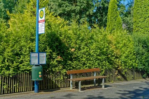 Empty bus stop with  bench Stock Photos