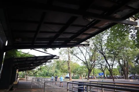 Empty bus stop. midday. no vehicles Stock Photos