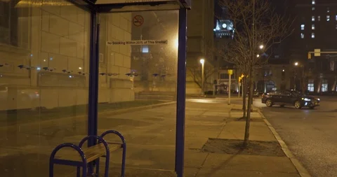 Empty Bus stop at night in downtown Buffalo New York Stock Footage 122211969