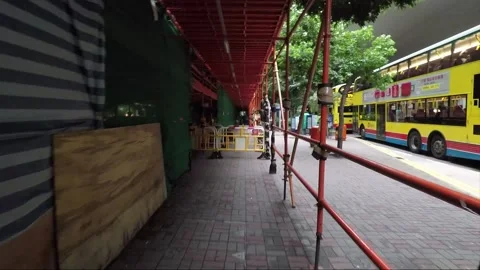 Empty buses under the bridge at the end of route, camera move, Hong Kong Stock Footage 143399458
