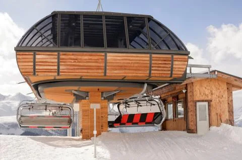 Empty cable car stop with a mountain Stock Photos