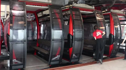 Empty cable cars ride inside the cable car station in Sun World Stock Footage 314462227
