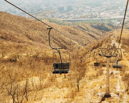 Empty cableway over the mountain Stock Photos