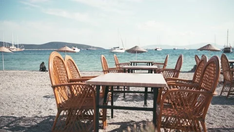 Empty cafe on the beach is waiting for guests clients. Summer vacation concept Stock-Footage 132382644