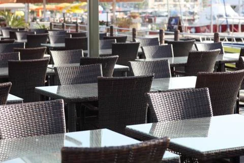 Empty cafe on harbor Stock Photos