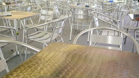 Empty Cafe Interior Featuring Metallic Chairs and Tables During Midday Stock Footage 304169251