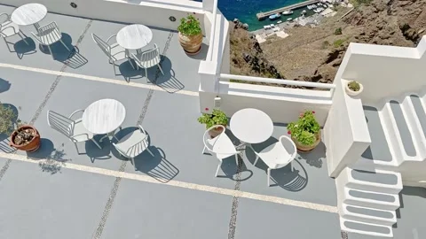 Empty cafe tables on greek island Santorini in Greece, Europe Stock Footage 150728026