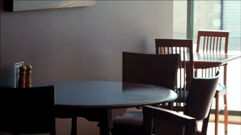 Empty cafe tables &amp; a waiter Stock Footage 22665106