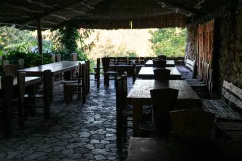 Empty cafe terrace at sunset Stock-Fotos