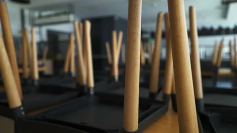 An empty cafe without customers due to the coronavirus pandemic. Rows of chairs. Stock Footage 138667457