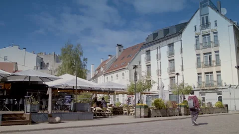 Empty cafes and shuttered shops in Old Riga during peak tourist season. Stock Footage 309554024