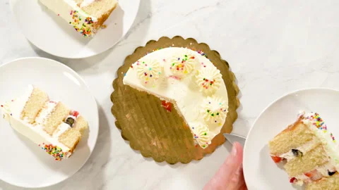 Empty Cake Board Surrounded by Cake Slices 스톡 동영상 320884717