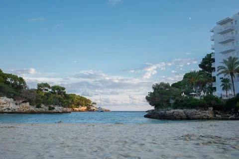 Empty Cala Ferrera beach in the evening panoramic view. Cala D'or on Mallor.. Stock Photos