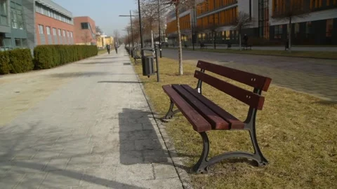 Empty campus in Krakow - university without students -  lonely empty bench. Stock Footage 150902939