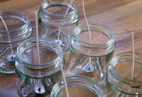Empty candle jar with wick Stock Photos