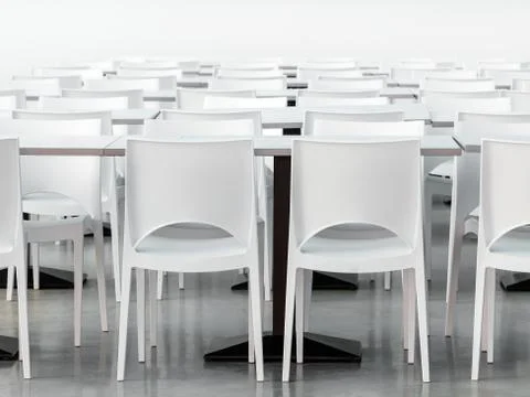 Empty canteen with modern styled white chairs and tables Stock Photos