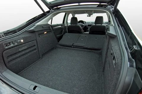 Empty car trunk with folded seats Stock Photos