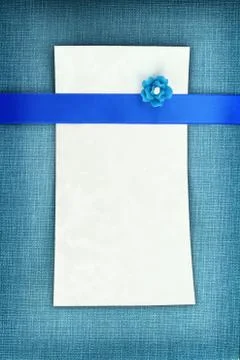 Empty card on blue fabric texture Stock Photos
