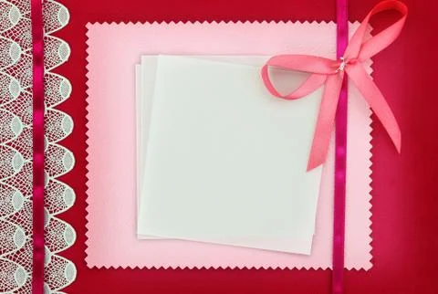 Empty card on pink fabric texture Stock Photos
