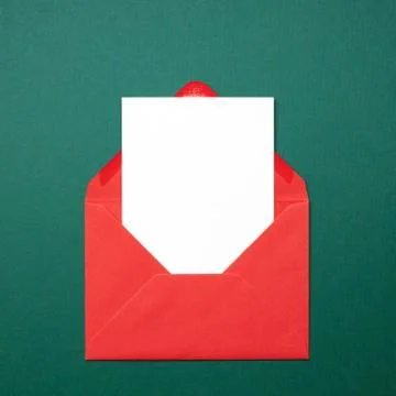 Empty card in red envelope. Stock Photos