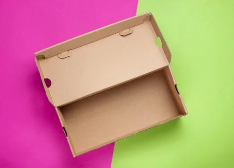 Empty cardboard box on colored background. Top view 写真素材
