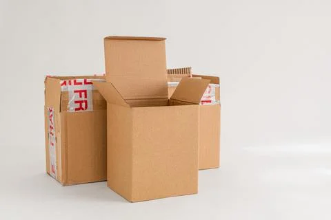 Empty cardboard boxes on white background Foto stock
