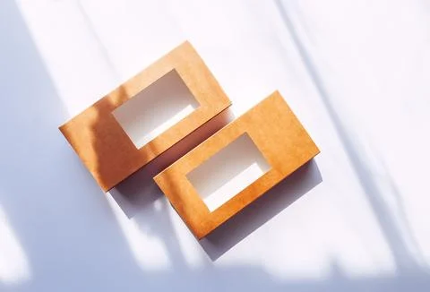 Empty cardboard boxes on white background. Eco-friendly packaging. Stock Photos