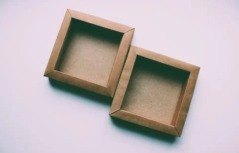 Empty cardboard cases side by side isolated on white flat lay photo 写真素材