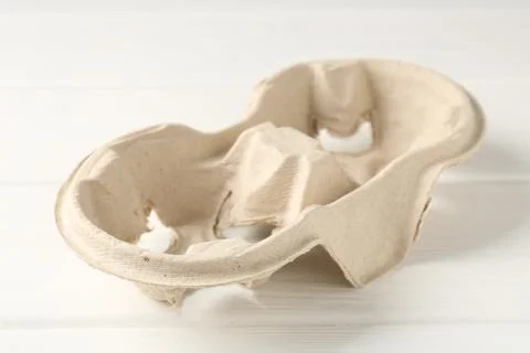Empty cardboard cup holder on white wooden table, closeup Stock Photos