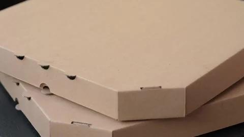 Empty cardboard rectangular brown box for delivery of delicious pizza Stock Footage 291322525