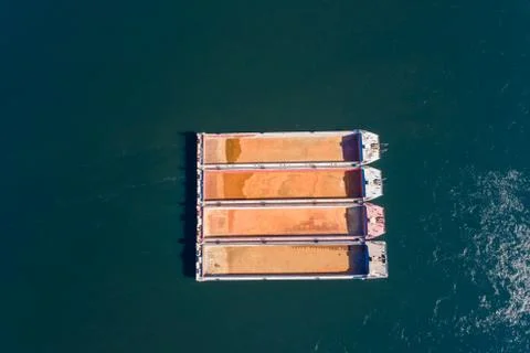 The empty cargo barge on an anchor in the middle of the river Foto stock