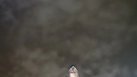 Empty cargo ship barge crossing a frame Stockbeeldmateriaal 154501487